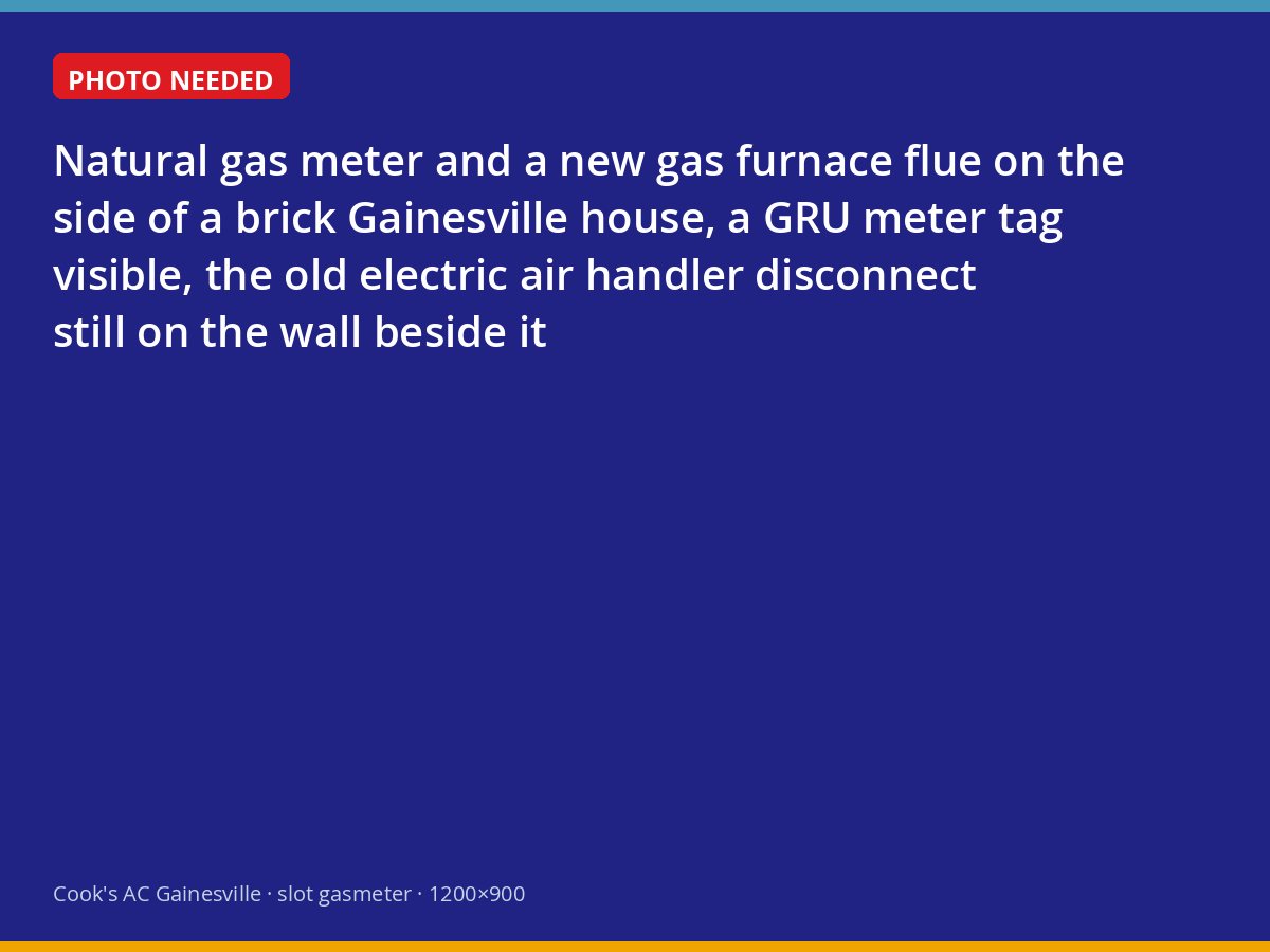 Gas meter and furnace flue beside a Gainesville house after a conversion from electric heat