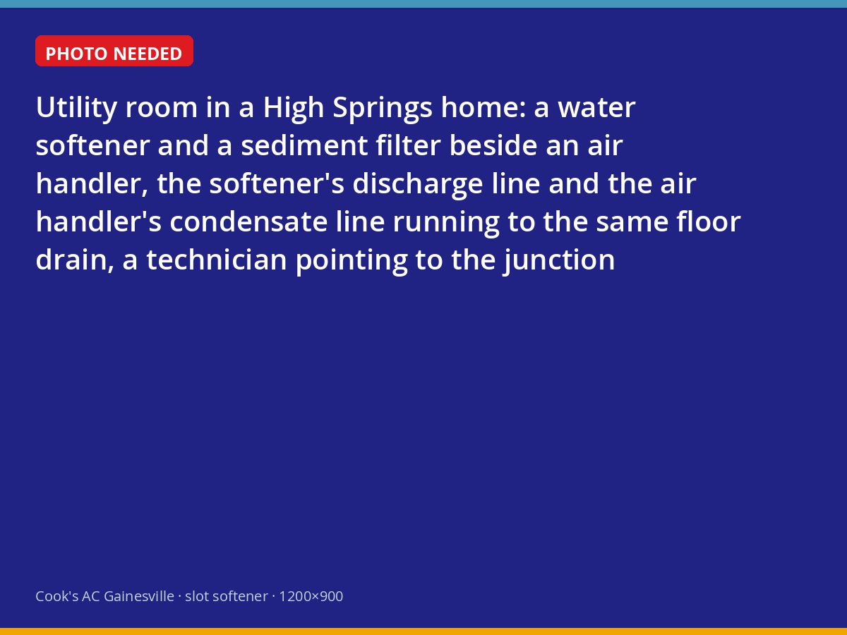 Water softener discharge and condensate drain sharing a floor drain beside an air handler in High Springs