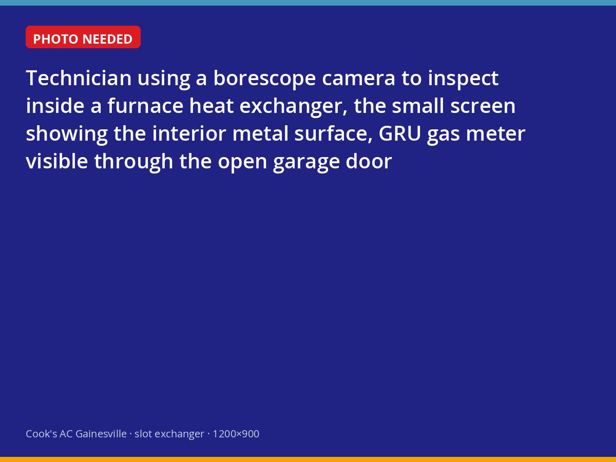 Technician inspecting a furnace heat exchanger with a borescope camera in a Gainesville garage